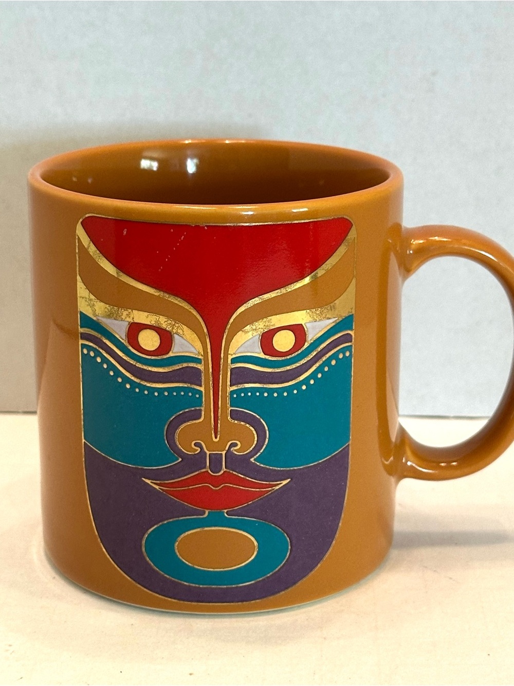 Laurel Burch Orange Mug with Multicolor Abstract Mask